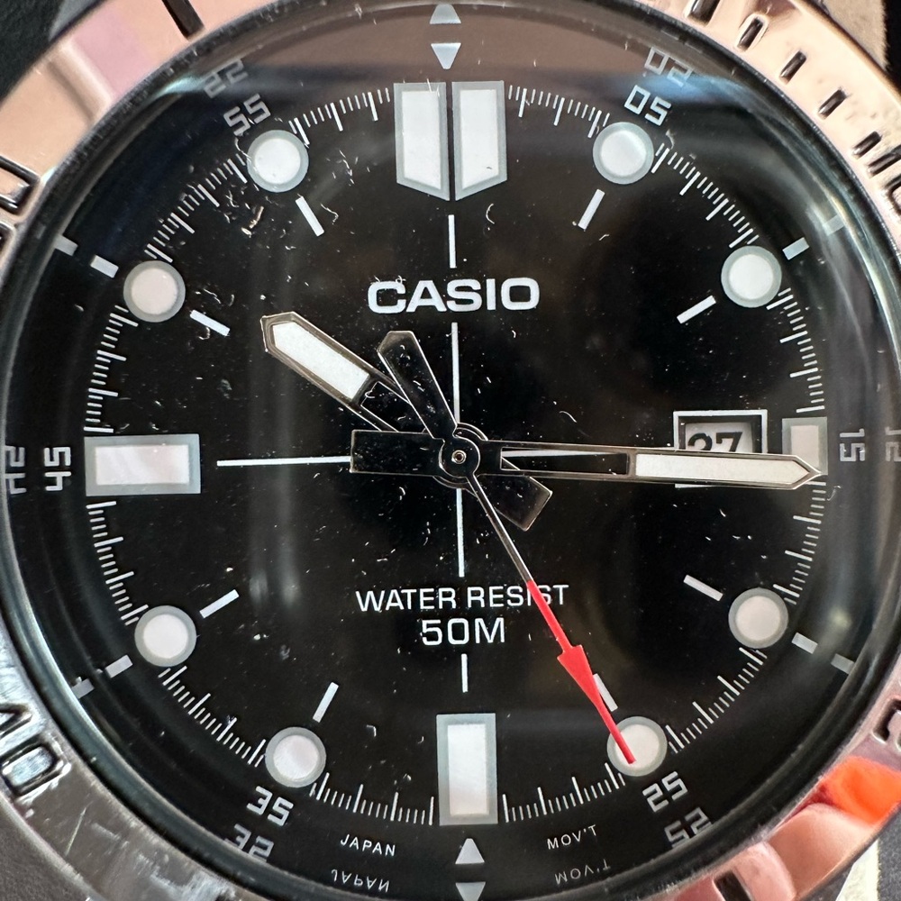 Casio Black Dial Watch with Silver Bezel